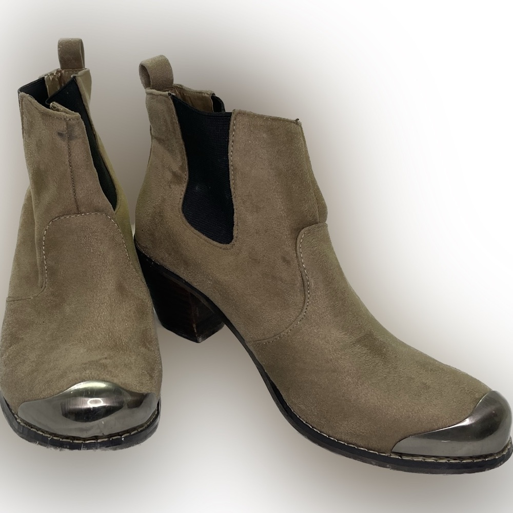 Restricted Ladies size 6 faux suede boots with metal toe accents.